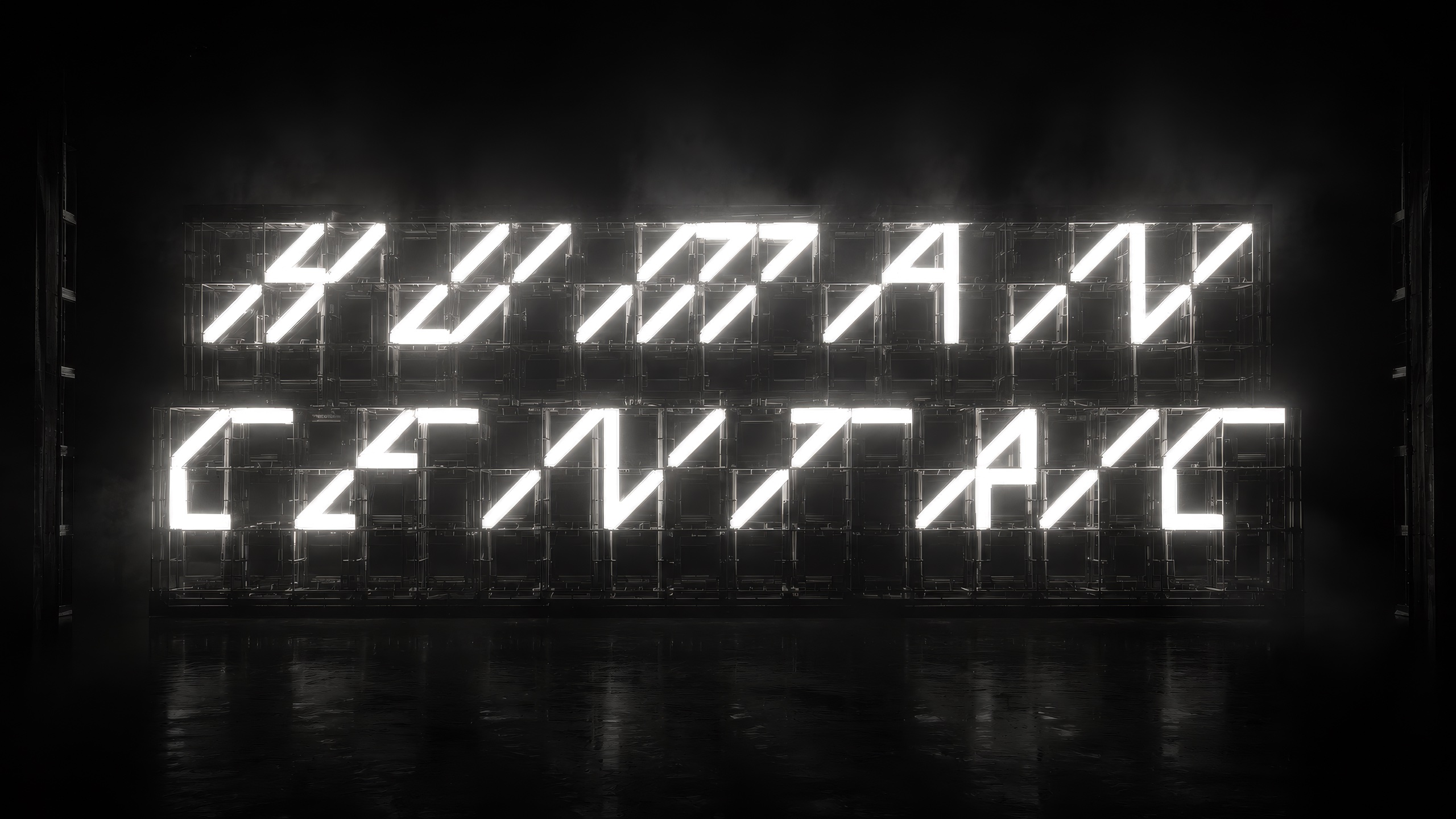 The HUMANCENTRIC neon sign, lit in the dark